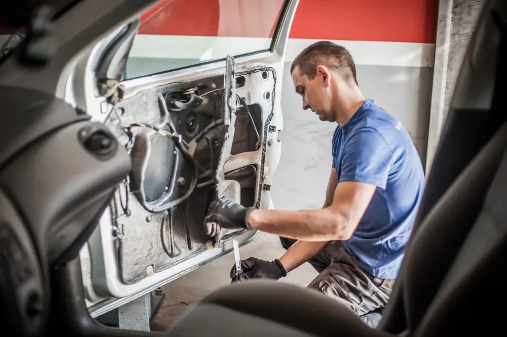 a man working on a car